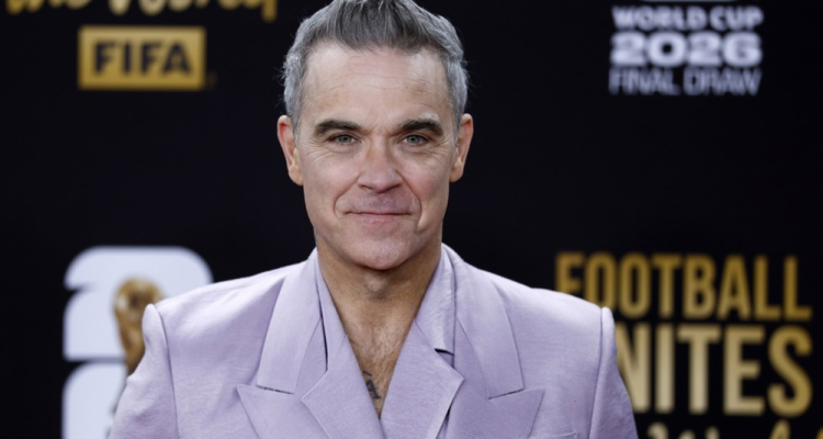 Robbie Williams z novim albumom prehitel The Beatles